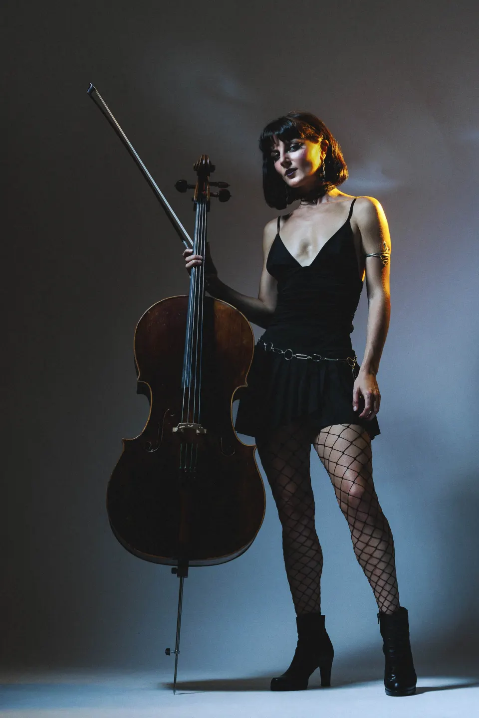 Sahara von Hattenberger standing with her cello